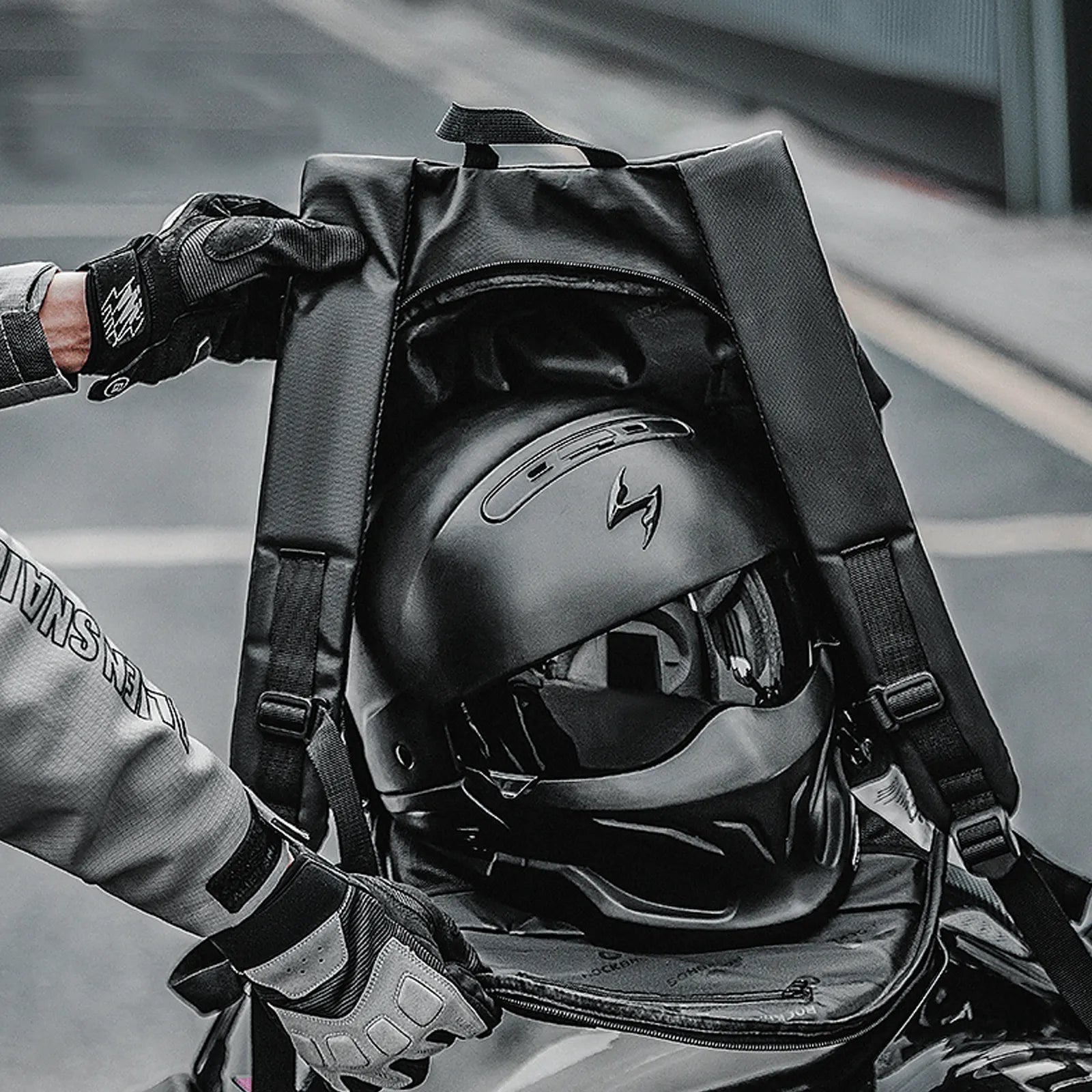 ROCKBROS 14.5L double-layer motorcycle riding backpack in black, sleek aerodynamic design for riders.
