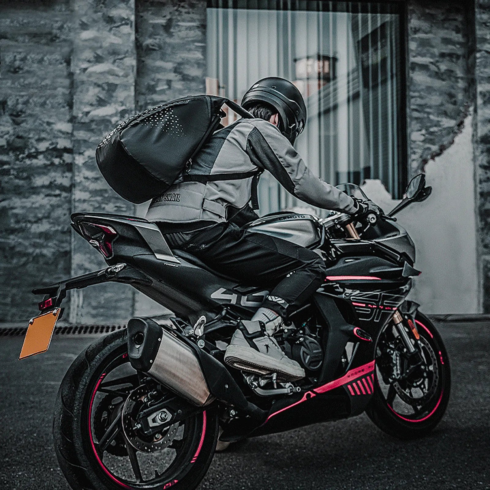 ROCKBROS 14.5L double-layer motorcycle riding backpack in black, sleek aerodynamic design for riders.
