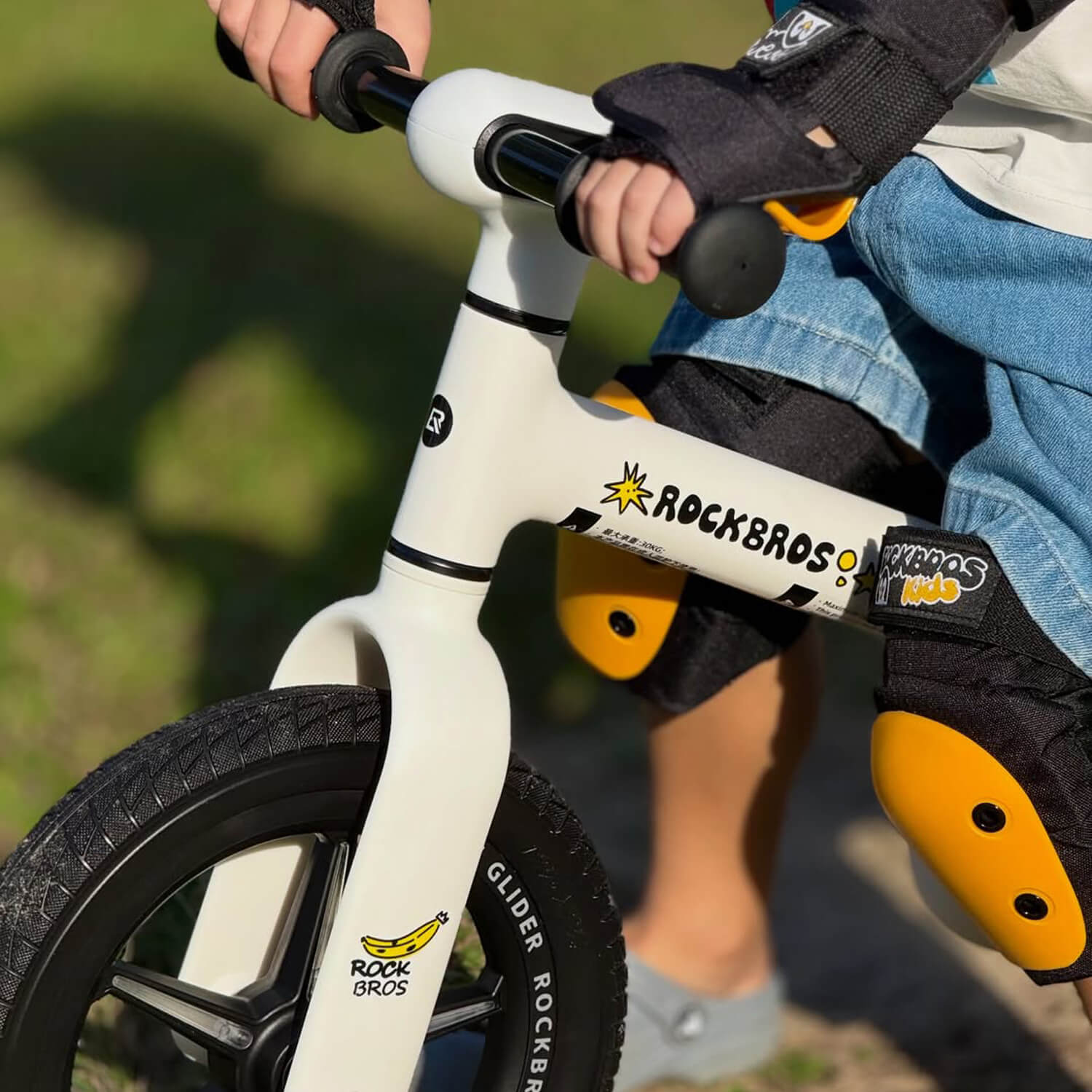 rockbros kids riding bicycle outdoors with stable frame and adjustable seat
