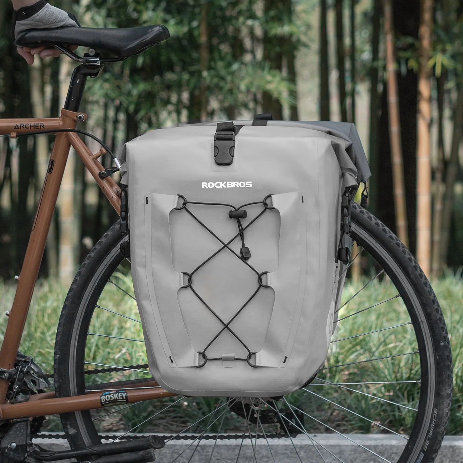 ROCKBROS 25L waterproof bike pannier bag installed on bicycle rear rack for touring and commuting.
#color_grey